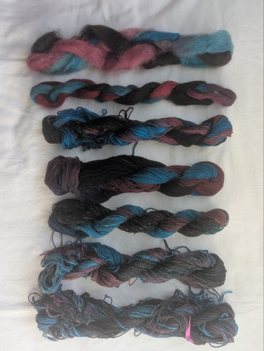 Lot Of 7 Skeins Wool & Wool Blend Yarns Blue Pink Charcoal Multi-Colorway